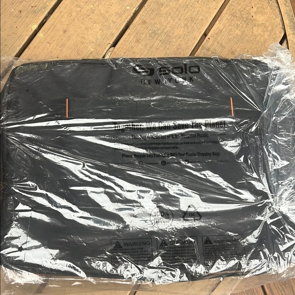 Solo Black and Orange Laptop Bag Professional Design